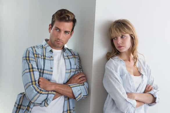 Unhappy couple not talking after an argument at home