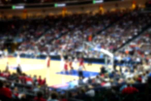 blurred background of sports arena crowd