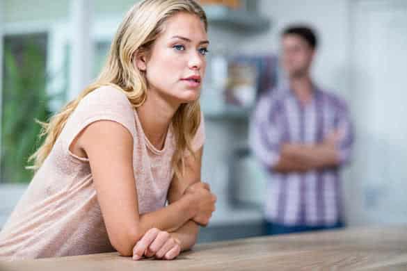 Annoyed couple ignoring each other in the kitchen 6