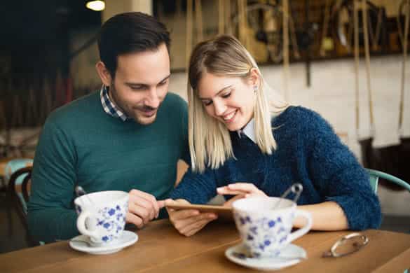 Couple in love dating in restaurant