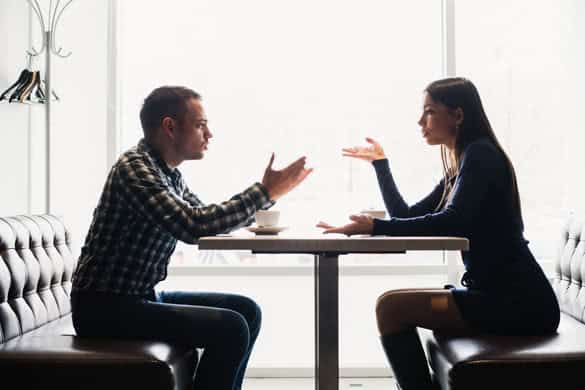 Man and woman in discussions in the restaurant