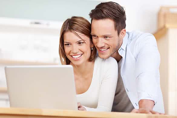 couple looking at laptop