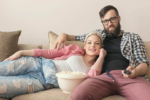 young couple watching a movie