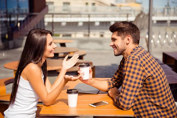 couple talking in a coffee shop