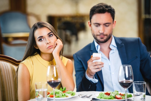 couple bored on a date