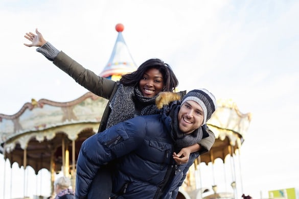 Couple having fun at a amusement park